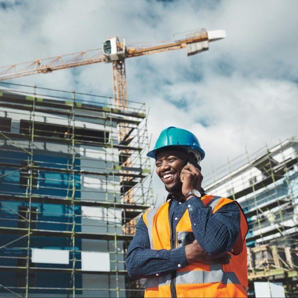 best-building-contractor-block-shot-young-man-using-smartphone-while-working-construction-site