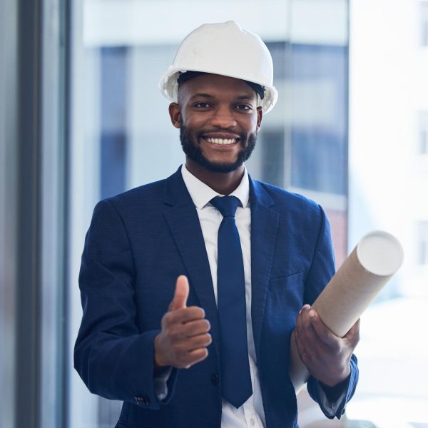 thumbs-up-happy-engineer-architect-black-man-with-construction-success-goal-target-plan-support-thank-you-construction-worker-with-smile-architecture-building-design-approval-portrait